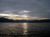 Crossing Lake Toba from Tuk Tuk to Parapat with Pangulubao ahead