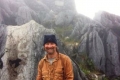 David below stature of Christ on summit of Matebean (Brigitte Haering, July 2018)