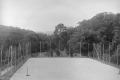 View of Gunung Angsi bungalow tennis court (EJH Corner, c1930)